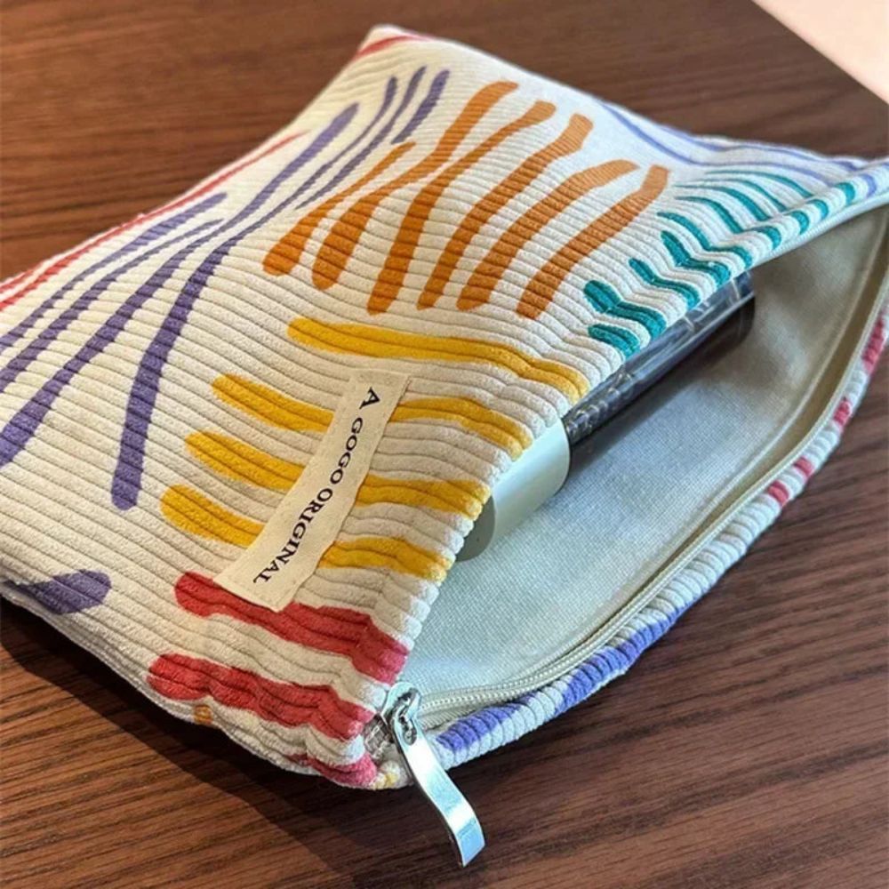 trousse cosmétique avec motifs colorés en velours