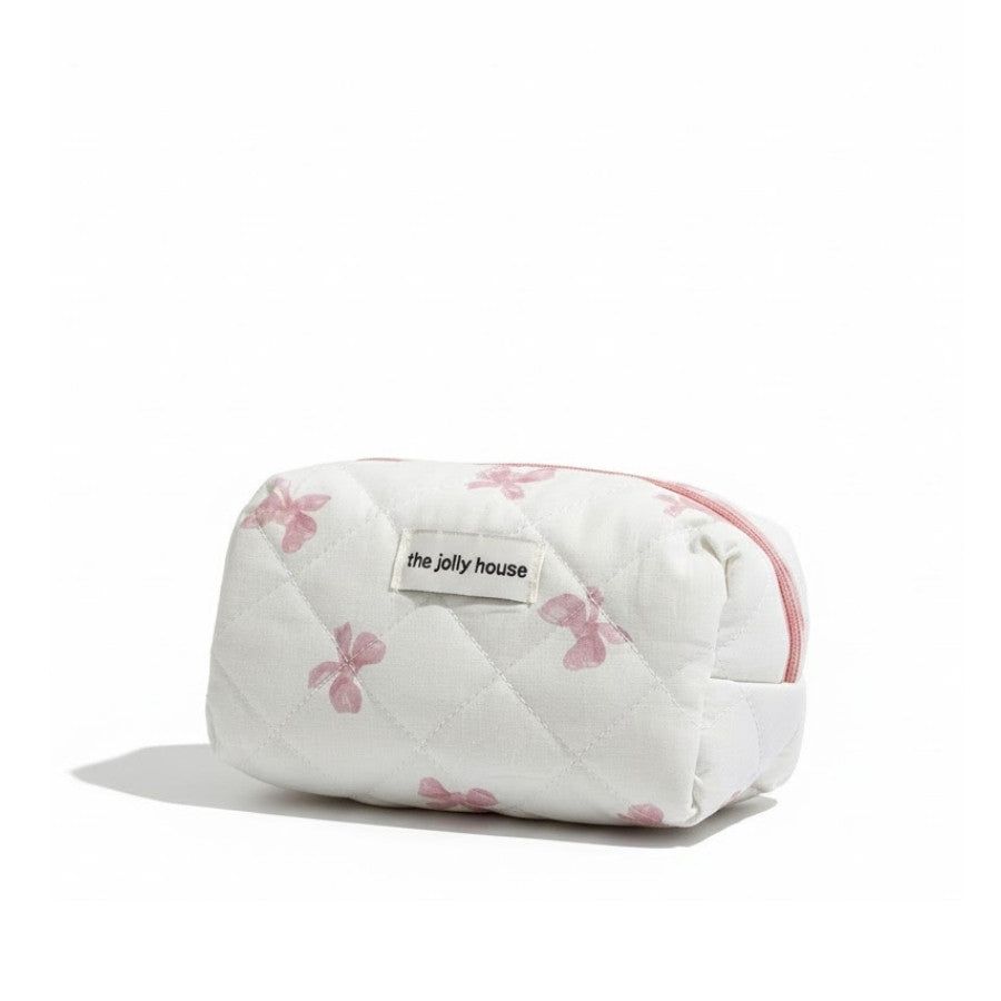 trousse de toilette en tissu motifs nœuds papillon