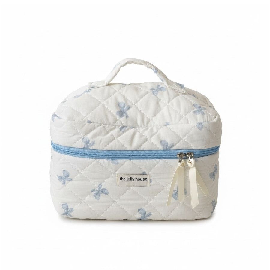 trousse de beauté tissu matelassé design nœuds papillon