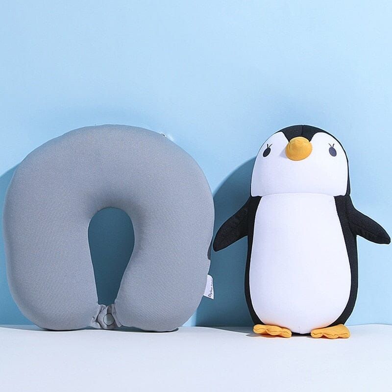coussin en peluche pingouin pour le voyage