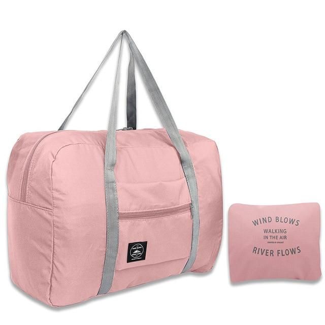 sac de voyage pliable "wind blow river flows" rose