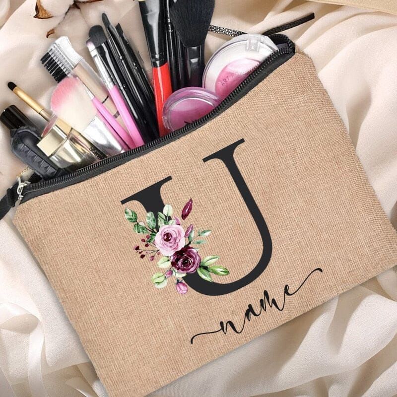 trousse à maquillage pratique avec initiale et conception florale