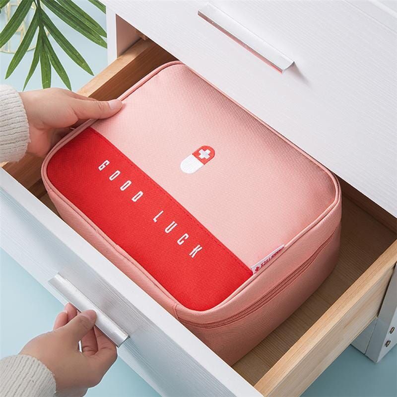 trousse de voyage rose pour soins médicaux